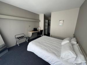 Katil atau katil-katil dalam bilik di Hôtel Dupleix - Hyper centre - Réouverture