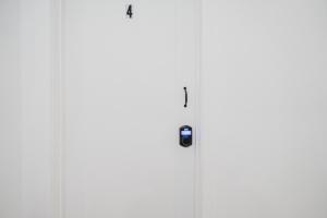 a white door with a lock on it at Chambre 4 - appartement 2 dans un appartement PARTAGÉ in Montréal