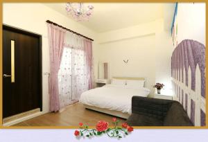 Voodi või voodid majutusasutuse Rose Cottage B&B toas