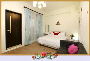 Voodi või voodid majutusasutuse Rose Cottage B&B toas