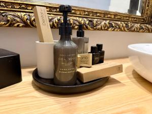 a bottle of wine sitting on a table at Karibu Lodge Boutique in Vega de San Mateo +119 photos