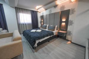 Ένα ή περισσότερα κρεβάτια σε δωμάτιο στο No58Hotel