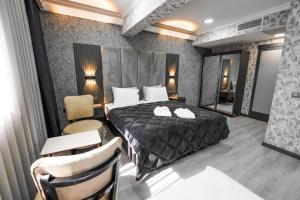 Ένα ή περισσότερα κρεβάτια σε δωμάτιο στο No58Hotel