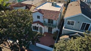 an overhead view of a white house with a roof at Beach Life in Belmont Shore in Long Beach