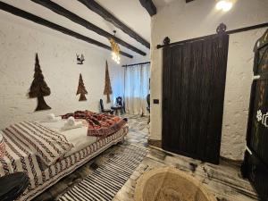 Postel nebo postele na pokoji v ubytování PENSIUNEA Agi Traditional - 4 MARGARETE + 151 fotografií