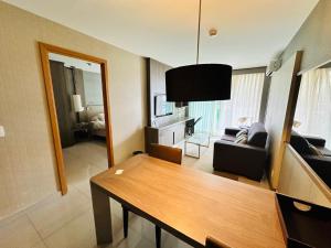 Et tv og/eller underholdning på Brisas do Lago + 1 billede