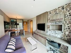 Et tv og/eller underholdning på Brisas do Lago