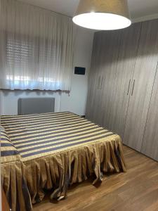 Ένα ή περισσότερα κρεβάτια σε δωμάτιο στο Home relax +1 φωτογραφίες