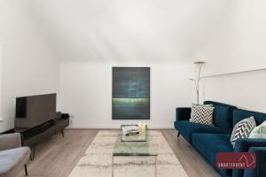 Et tv og/eller underholdning på Richmond - 2 Bedroom Duplex Flat - With Parking