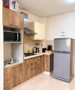 Køkken eller tekøkken på Votre Cocon Moderne - Central & tout confort