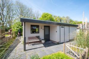 Κήπος έξω από το Duynhof nabij Strand, duinen, bos en stad - 5 personen