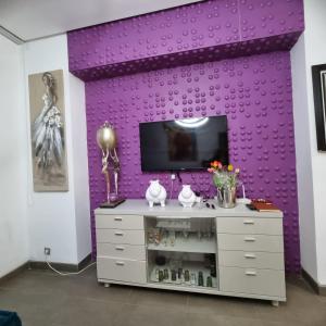 Μια τηλεόραση ή/και κέντρο ψυχαγωγίας στο Appartement front mer à Casablanca