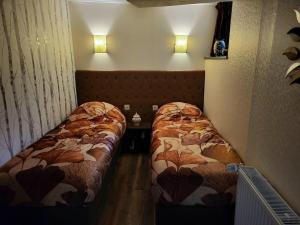 Postel nebo postele na pokoji v ubytování Haus an der Werbe Studio Werbetal