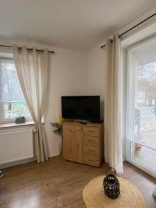 TV a/nebo společenská místnost v ubytování Rosemary Cottage