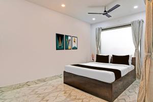 Giường trong phòng chung tại Hotel O AI HOTEL