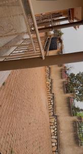 an overhead view of a brick walkway under a bridge at Moods Holiday Homes in Bulenga