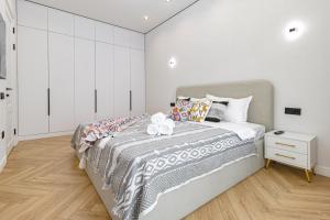 Ένα ή περισσότερα κρεβάτια σε δωμάτιο στο Aitas Luxe Comfort