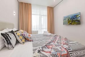 Ένα ή περισσότερα κρεβάτια σε δωμάτιο στο Aitas Luxe Comfort