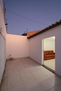 Balkoni atau teres di Casa com 2 Quartos Climatizados e Garagem
