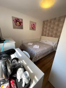 Ένα ή περισσότερα κρεβάτια σε δωμάτιο στο Marisah Residence #8 +2 φωτογραφίες