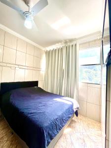 Postel nebo postele na pokoji v ubytování Estação Praia VLT