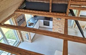 an overhead view of a kitchen in a loft at 3 Bedroom Amazing Home In Erslev in Erslev