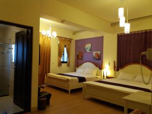Postel nebo postele na pokoji v ubytování Money B&B