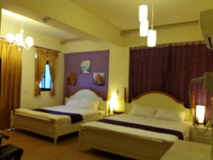 Postel nebo postele na pokoji v ubytování Money B&B