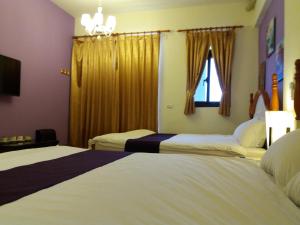 Postel nebo postele na pokoji v ubytování Money B&B