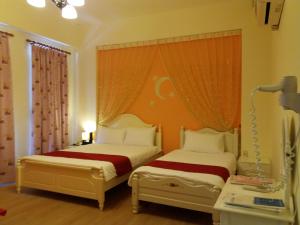 Postel nebo postele na pokoji v ubytování Money B&B