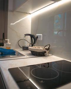 Η κουζίνα ή μικρή κουζίνα στο Davi Apartments