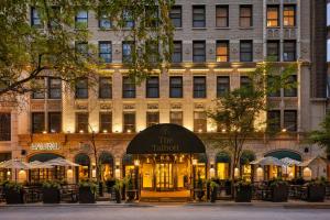 a hotel front of a building with a sign that reads the hotel at The Talbott, Autograph Collection in Chicago