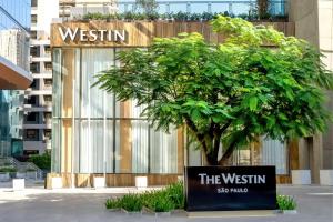 a sign for the westin in front of a tree at The Westin Sao Paulo in Sao Paulo +83 photos