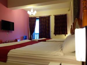 Postel nebo postele na pokoji v ubytování Money B&B