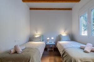 Postel nebo postele na pokoji v ubytování Finca Hoya de La Campana