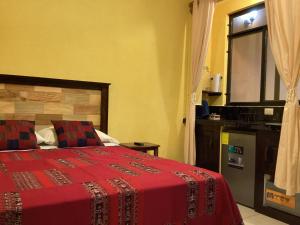Katil atau katil-katil dalam bilik di Andrea apartamento