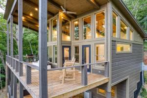 a modular home with a large deck at Mountain Abode - Luxury Cabin with Hot Tub in Blue Ridge +56 photos