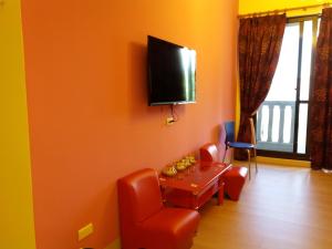 TV a/nebo společenská místnost v ubytování Money B&B