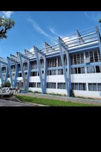 Bygningen som feriehuset ligger i + 4 billeder