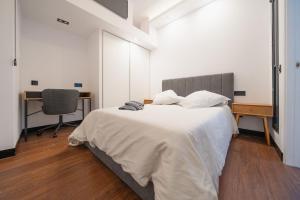 Ένα ή περισσότερα κρεβάτια σε δωμάτιο στο Coliving Canteras Connect Suites