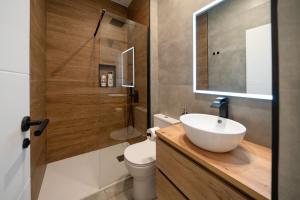 Ένα μπάνιο στο Coliving Canteras Connect Suites +39 φωτογραφίες