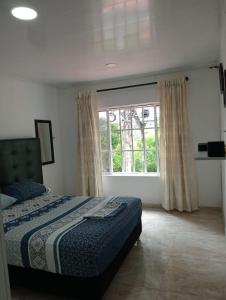 Postel nebo postele na pokoji v ubytování Apartamento Fontana 2