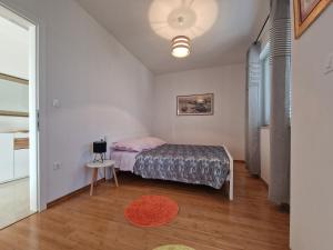 Voodi või voodid majutusasutuse Apartments by the sea Sali, Dugi otok - 19880 toas