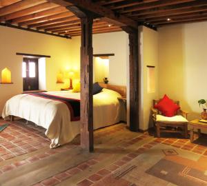 Letto o letti in una camera di The Inn Patan