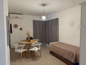 En eller flere senge i et værelse på LUMAAN