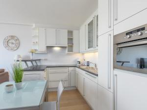 A kitchen or kitchenette at Studio with terrace and sea view