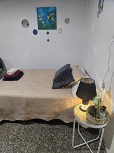 Postel nebo postele na pokoji v ubytování Inmejorable Monoambiente temporario en Corrientes + 1 fotografie