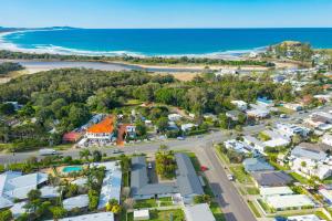 an aerial view of a town with the ocean at Beach Shack No. 7 in Crescent Head