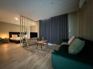 TV a/nebo společenská místnost v ubytování Perral Nature - Casa da Oliveira - Gerês