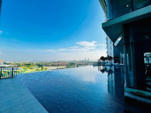 a view of a river from a building at Dreamy Sunsuria Forum Homes-Setia City Mall, Setia City Convention Centre and National Institute of Health in Shah Alam